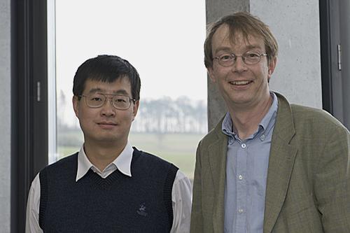 Jun Ye (left) with Tilman Esslinger